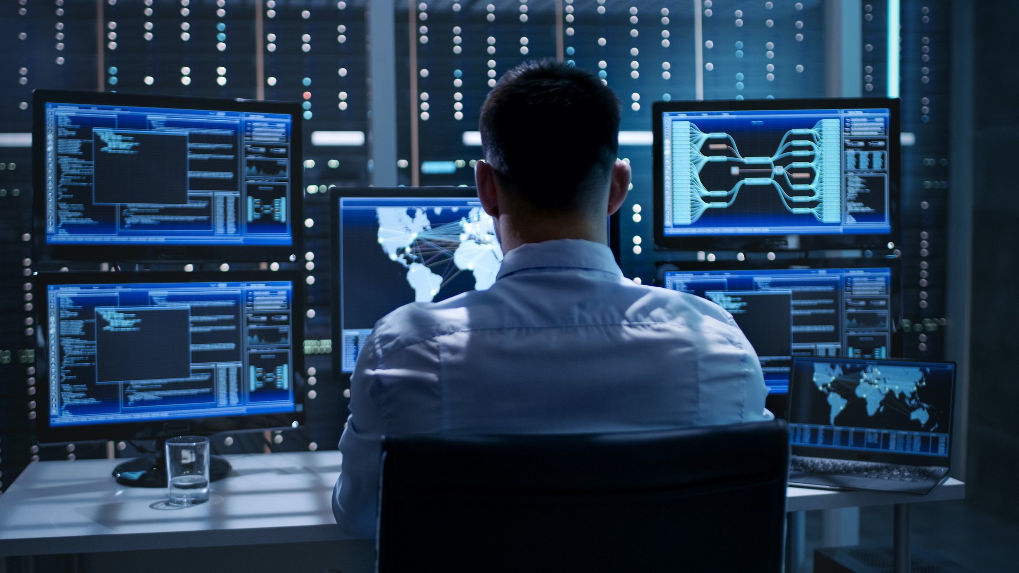 Cybersecurity Man sitting at desk