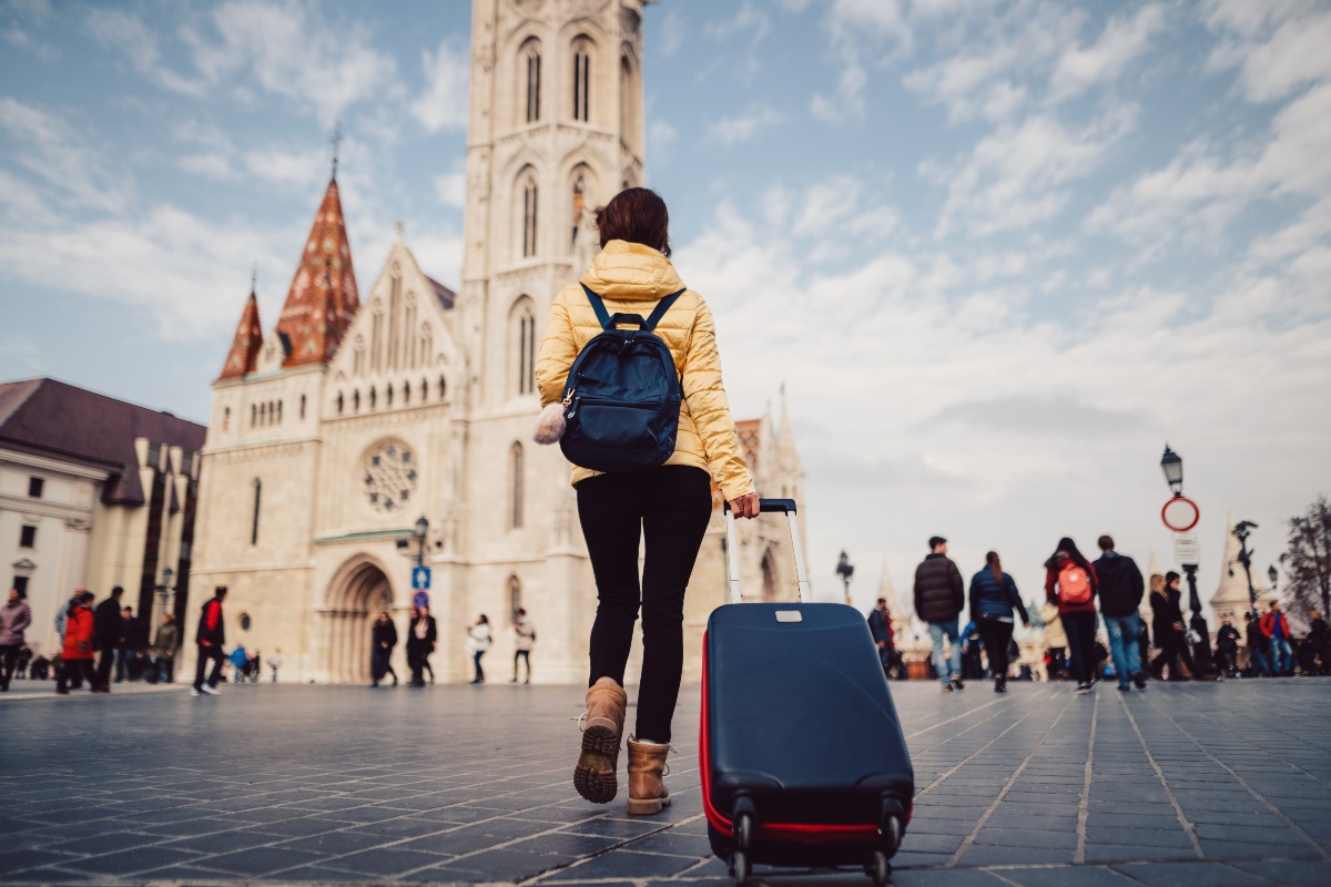 student with suitcase