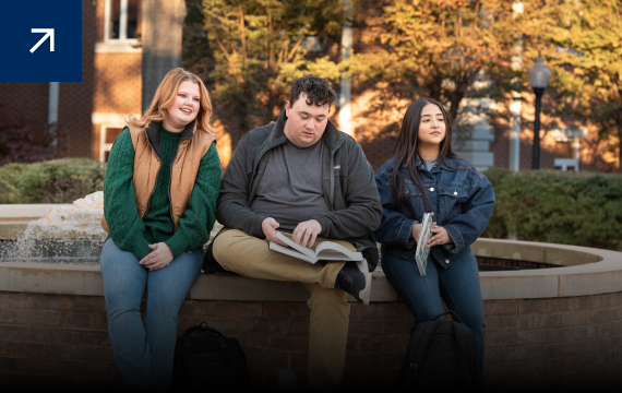 Students at the Athens State University Fountain