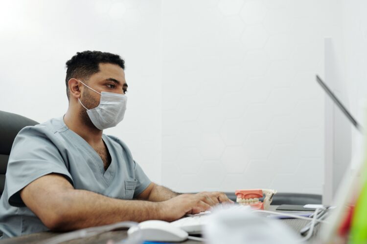 Nurse on computer