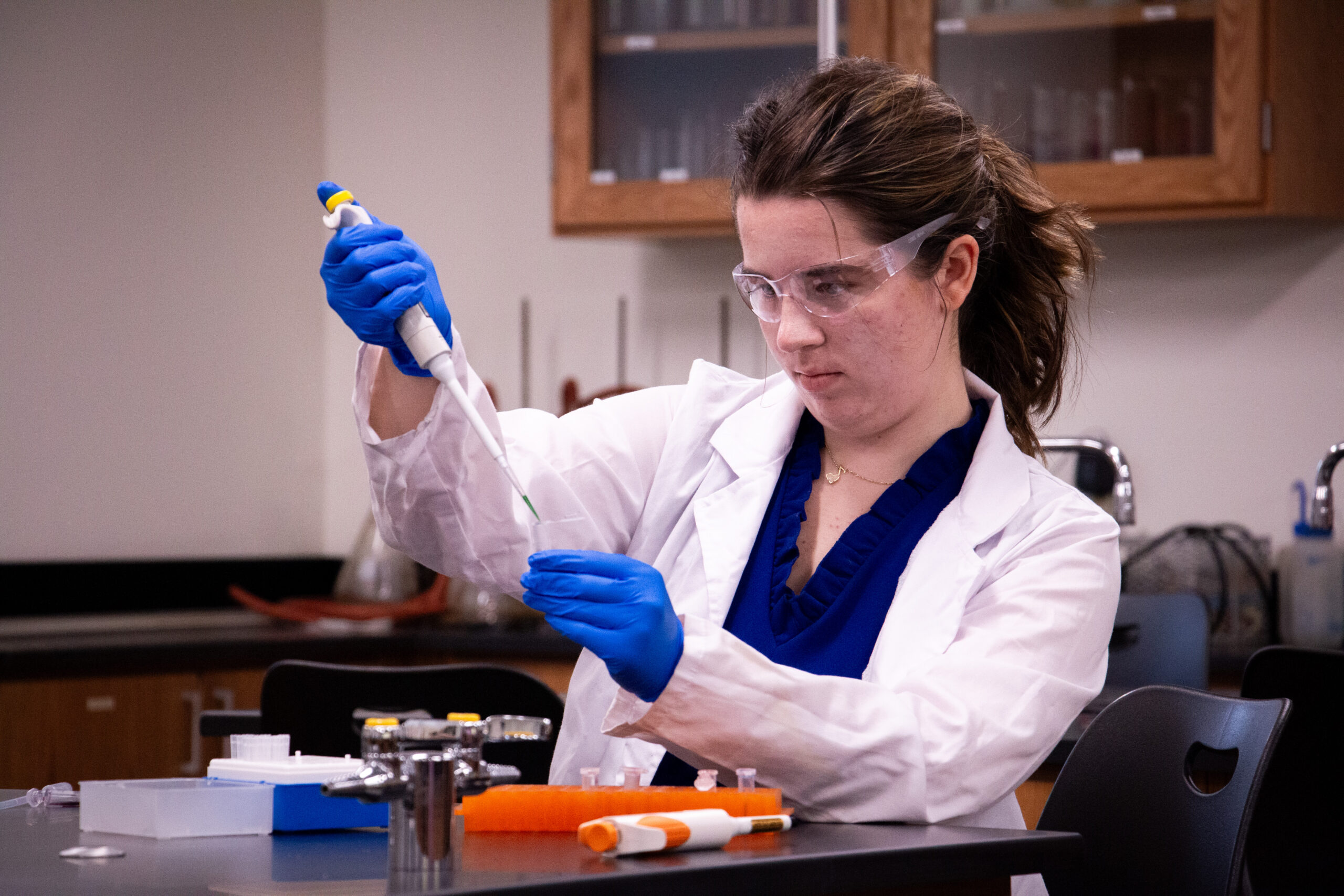 Student Conducting Lab Experiment