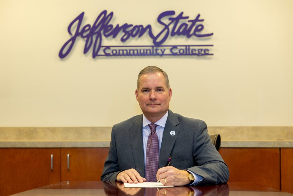 Dr. Keith Brown, President of Jefferson State Community College, signing MOUs with Athens State supporting both the certification and non-certification pathways in Early Childhood Education.