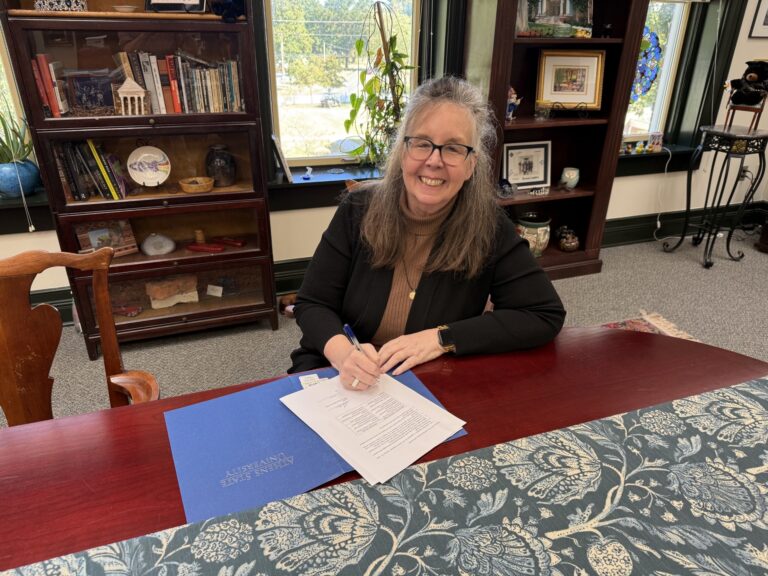 Dr. Wehlburg signing MOUs with Jefferson State supporting both the certification and non-certification pathways in Early Childhood